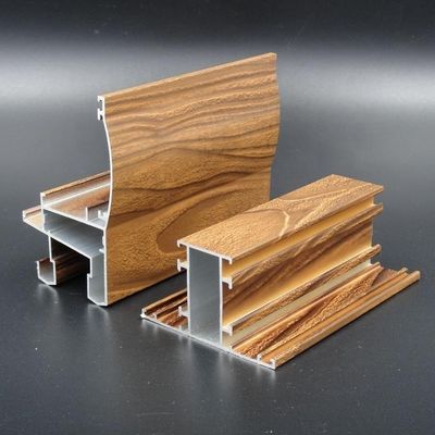 Prezzo buono Profilo di alluminio del grano di legno dell'Algeria & della Libia per la porta e la finestra in linea